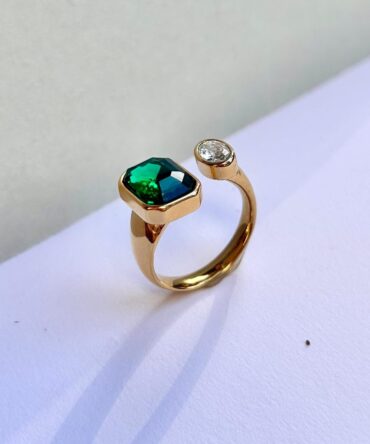 green and white emerald ring