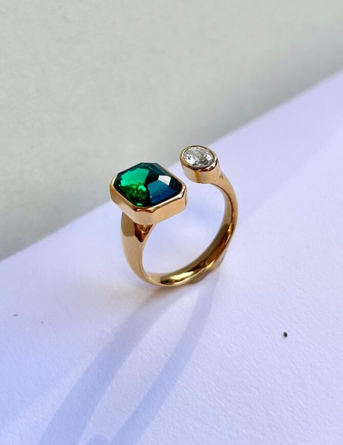 green and white emerald ring